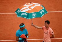 Halep reaches French Open Round 2; rain halts Nadal’s romp