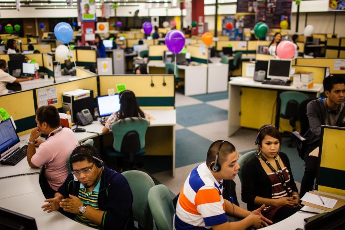 General Images Of Philippine Economy Ahead Of 2Q GDP For representation only. Business process outsourcing (BPO) workers are seen busy on the floor of a call center in Metro Manila. AP