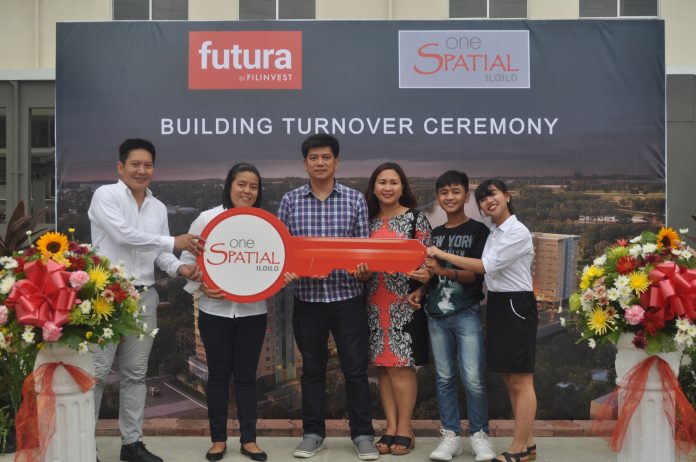 BANNER_Representing the unit owners, Cherry Dey and family joined Filinvest officials in inaugurating One Spatial Iloilo's first building.
