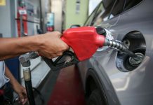 Photo for representation only. A gasoline station attendant fills up a car in Quezon City. ABS-CBN NEWS