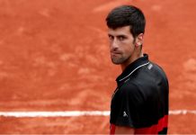 Troubled Djokovic to play Wimbledon warm-up