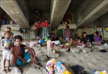 City’s ‘one time, big time’ operation nets 59 Badjaos UNDER THE BRIDGE. These Badjaos have found a sturdy refuge under this bridge in Barangay Buhang, Jaro, Iloilo City. Conflict between Muslim separatists and government troops in Mindanao has forced them to flee to Iloilo City. PSTMO PHOTO