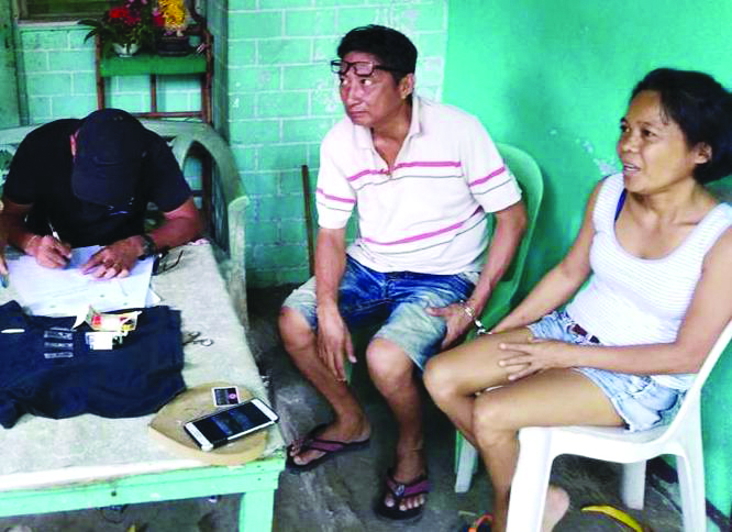 Live-in partners Stephen Diploma (center), 51, and Gladys Prizaldo, 46