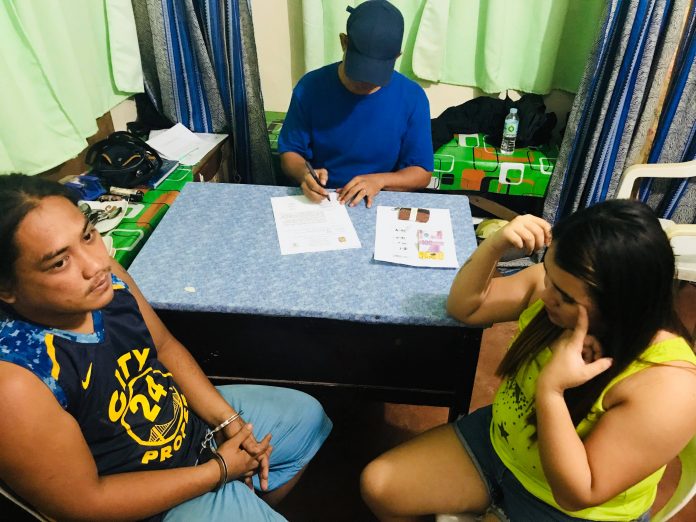 Drug pushing suspects Jerson “Bukol” Dingcong, 26, and Andrea May Capungha