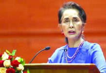 Suu Kyi to investors: Myanmar open for biz