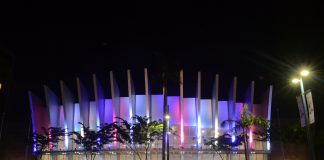 The Iloilo Convention Center is seen lit up in bright colors. IAN PAUL CORDERO/PN