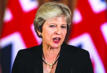 Theresa May urges Tory MPs to back Brexit deal