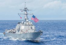 US destroyers sail in disputed South China Sea amid trade tensions