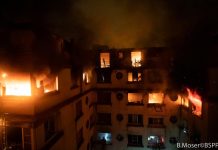 Woman held after Paris fire kills eight, injures 30