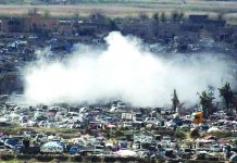 Battle rages for last Islamic State in Syria enclave