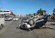 Car hits center island in Jaro