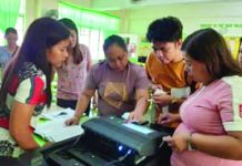 3,060 vote-counting machines will be used in Iloilo on May 9 Photo for representation only. Teachers serving as election inspectors conduct final testing and sealing of the vote counting machines in San Jose, Antique on Friday, May 10, 2019. PNA