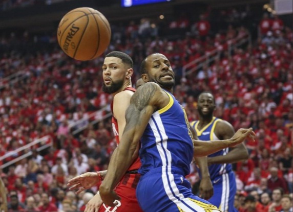 Houston Rockets guard Austin Rivers and Golden State Warriors guard Andre Iguodala
