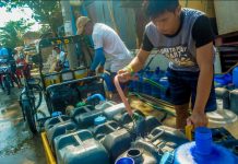 Iloilo gov’t takes measures to prevent ‘gastro’ surge Photo for representation only. A young man fills with water a buyer’s plastic containers in Barangay Mansaya, Lapuz, Iloilo City.