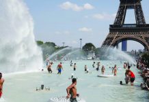 EUROPEAN HEATWAVE: France hits record temperature of 45.9°C People cool off in the Trocadero fountains across from the Eiffel Tower in Paris as a heatwave hit much of the country, France. The government is postponing exams, opening pools and urging residents to stay hydrated. AP VIA WASHINGTON POST