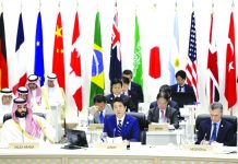 G-20 leaders facing calls to protect growth, open trade Japan’s Prime Minister Shinzo Abe, front row center, speaks while Saudi Crown Prince Mohammed bin Salman, front row left, and Argentina's President Mauricio Macri, front row right, listen during a working lunch at the Group of 20 (G-20) summit in Osaka, western Japan, Friday, June 28, 2019. AP