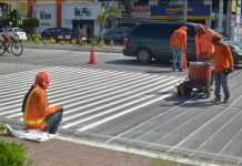 DPWH starts painting rumble strips on Diversion Road
