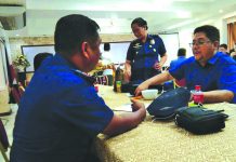 5 Roxas City villages now ‘drug-cleared’ Councilor Albert Gregory Potato of Roxas City, Capiz confers with city police chief Dante Tayco before the deliberation and declaration of the five city villages as drug-cleared areas by the Regional Oversight Committee in Iloilo City on July 4, 2019. ROXAS CITY PNP