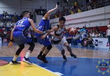 Biñan City Krah Heroes’ Allan Mangahas attacks two Cebu Sharks defenders. MPBL