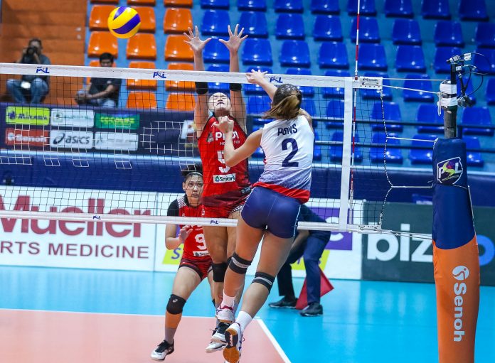 Negrense Bernadeth Pons of Petron Blaze Spikers directs her hit to PLDT Home Fibr Power Hitters’ Gretchel Soltones. PSL PHOTO
