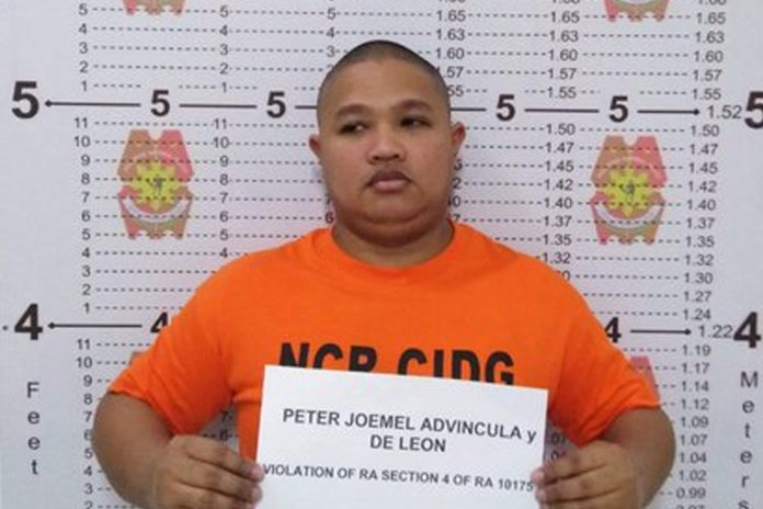 Bikoy Peter Joemel “Bikoy” Advincula was detained at the Criminal Investigation and Detection Group in Camp Crame over an arrest warrant for cyber libel rap on Monday. ABS-CBN NEWS