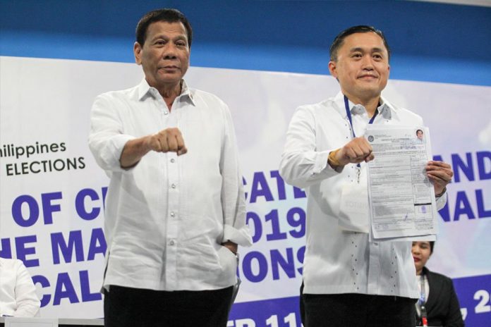 Bong Go and Duterte Neophyte Sen. Christopher “Bong” Go (right) says there will be no “conflict of interest” with his work at the Senate despite his close relationship with President Rodrigo Duterte. ABS-CBN NEWS