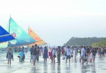 Firms violating Boracay’s easement rules demolished Crowd of tourists enjoy the world-famous white sand beach of Boracay Island in Malay, Aklan. The Boracay Inter-Agency Rehabilitation Management Group last week started the demolition of establishments violating the island’s easement rules. BOY RYAN ZABAL/AKEANFORUM