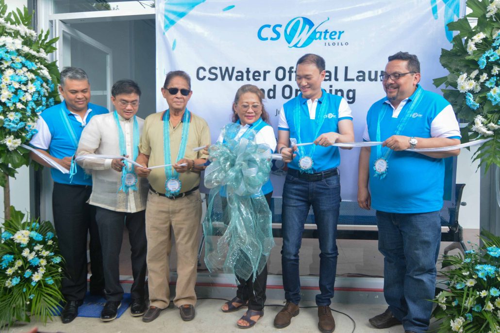 Ribbon Cutting Ceremony with Mayor Bienvenido Margarico and Vice Mayor Felizardo Amigable (third and second from left, respectively) together with the General Manager of Janiuay Water District, Sharon Rose BrasileƱo (middle).