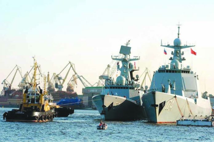 Chinese Type 052D missile destroyer Hefei A photo taken on July 27, 2017, shows Chinese Type 052D missile destroyer Hefei (right) and Chinese Type 054A frigate Yuncheng (NATO designation Jiangkai) docked in St Petersburg. AFP/GETTY PIC