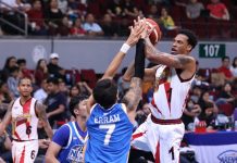 San Miguel Beermen’s Chris McCullough tries to get his shot up despite the defense of NLEX Road Warriors’ John Paul Erram. PBA PHOTO