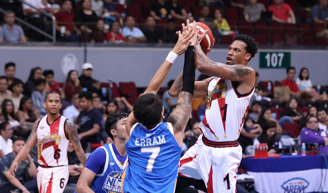 Chris McCullough San Miguel Beermen’s Chris McCullough tries to get his shot up despite the defense of NLEX Road Warriors’ John Paul Erram. PBA PHOTO