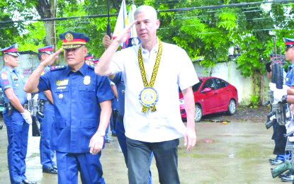 Negros Occidental Police Provincial Office chief Colonel Romeo Baleros (left) leads the arrival honors for Gov. Eugenio Jose Lacson. Lacson was the guest of honor during Monday’s flag-raising ceremony at Camp Alfredo Montelibano Sr. in Bacolod City. Negros Occidental PIO via PNA