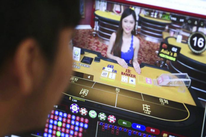 Photo shows the patron of a digital poker game in Manila. The Department of Finance in April said it wanted to collect an estimated P32 billion in annual income tax from foreign nationals working for Philippine online gaming operators (POGOs). SCMP
