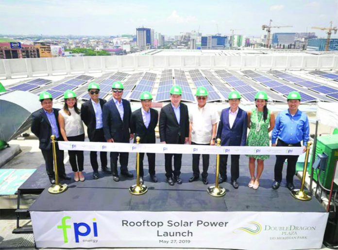 DoubleDragon Photo shows officers of First Philippines Holdings Federico Piki Lopez, Victor Lito Santos Jr., Chinie Defensor, Ariel Villasenor and Carlo Vega with DD Meridian Park Officers Amb. Benedicto Yujuico, Hannah Yulo, Edgar Injap Sia II, Ferdinand Sia and Tony Tan Caktiong during the unveiling event. DOUBLEDRAGON