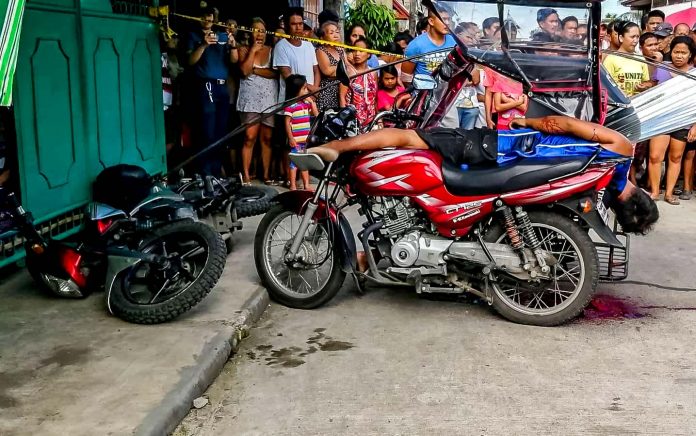 The 45-year-old tricycle driver Ernesto Regalado sustains gunshot wounds on the head and chest after an unidentified assailant peppered him with bullets in Barangay Jalandoni Estate, Lapuz district, Iloilo City on Friday, July 19. IAN PAUL CORDERO/PN
