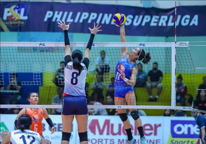 Fiola Ceballos Ilongga Fiola Ceballos of Generika-Ayala Lifesavers dumps the ball against the defense of fellow Ilongga Aiza Maizo-Pontillas of Petron Blaze Spikers. PSL PHOTO