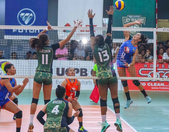 Fiola Ceballos Ilongga Fiola Ceballos of Generika-Ayala Lifesavers scores over the defense of Marjana Phillips of Sta. Lucia Lady Realtors. PSL