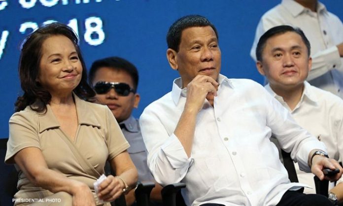 GMA-Duterte President Rodrigo Duterte chats with outgoing House Speaker Gloria Arroyo, in this April 9, 2018 photo. Duterte recently claimed that he has killed someone, thinking Arroyo – who was then president – will like it. PRESIDENTIAL PHOTO