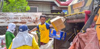 Commissioned personnel of J.S Layson & Co., Inc. collect garbage of residents in Barangay Burgos-Mabini, La Paz, Iloilo City on Tuesday morning. Republic Act 9003, or the Ecological Solid Waste Management Act of 2000, mandates local government units to adopt proper segregation, collection, transport, storage, treatment, and disposal of solid waste through the formulation and adoption of the best environmental practices. IAN PAUL CORDERO/PN