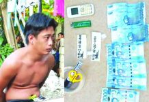 Numanacia drug suspect falls in buy-bust Construction worker Hilberto Reyes sits handcuffed after policemen caught him in an entrapment operation in Barangay Poblacion, Numancia, Aklan on July 26. Recovered from his possession were P8,000 marked money and a cellphone. RODNEL AGUIRRE VIA AKEAN FORUM