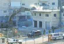 Israel demolishes homes on Jerusalem outskirts An Israeli machinery demolishes a Palestinian building in the village of Sur Baher which sits on either side of the Israeli barrier in East Jerusalem and the Israeli-occupied West Bank July 22, 2019. REUTERS