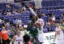 Columbian Dyip’s Jaymar Perez eludes the defense of NorthPort Batang Pier’s Moala Tautuaa for a layup. PBA