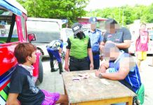 ‘Shabu’ puts Guimaras local behind bars Drug suspect John Alfred Lacson sits handcuffed after police officers caught him in an entrapment operation in Barangay Rizal, Jordan, Guimaras on Tuesday, July 9. PDEA REGION 6