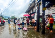 WV ON ‘BLUE ALERT’: Disaster body warns of floods, landslides WATER, WATER EVERYWHERE. Residents of Barangay San Nicolas in Iloilo City’s La Paz district wade through murky floodwater after a heavy downpour. Other parts of the city with clogged drainage have this problem, too. Monsoon rains enhanced by tropical depression “Falcon” also forced the city government to suspend classes yesterday, July 16, 2019. IAN PAUL CORDERO/PN