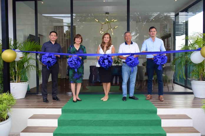 Livingsprings (From left) Executive Director Antonio Martin Albert, Chief Executive Officer Lily Chan, Managing Director Archt. Monique Albert-Lopez, Board of Director Greg Yang and special guest Carlo Lopez lead the ribbon-cutting ceremony of 10 Acacia Place. Livingsprings