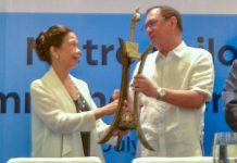 Expectations high for new water distributor Dr. Jessica Salas (left), chairperson of Metro Iloilo Water District board of directors, turns over to Jose Ma. Lim, Metro Iloilo Water director, a symbolic faucet on July 1, 2019 to signify Metro Iloilo Water’s takeover of the water distribution operation of Metro Iloilo Water District. Metro Iloilo Water will now be serving Iloilo City seven municipalities in Iloilo province – Oton, Maasin, Cabatuan, Santa Barbara, Pavia, Leganes, and San Miguel. IAN PAUL CORDERO/PN