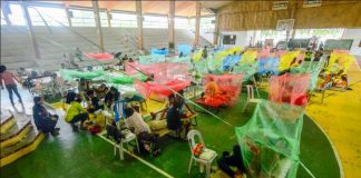 A REFUGEE CAMP? No. This is the gymnasium of Maasin, Iloilo. It has been temporarily converted into a mini hospital to accommodate dengue patients. The municipality’s rural health unit is already packed with patients. IAN PAUL CORDERO/PN