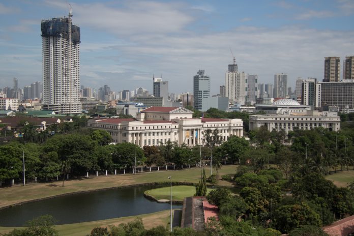 Manila as seen from Intramuros Photo shows the Manila skyline as seen from the walled city of Intramuros. WIKIMEDIA