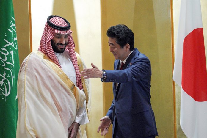 Mohammed bin Salman Saudi Arabia's Crown Prince Mohammed bin Salman, left, and Japanese Prime Minister Shinzo Abe, right, shake hands during their meeting in Osaka, western Japan Sunday, June 30, 2019. REUTERS