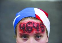 Besieged Puerto Rican guv mum amid protests Nicole Diaz wears special effects make-up with hurricane Maria’s death toll number written on her forehead, while protesting against Governor Ricardo Rossello, in San Juan, Puerto Rico, Friday, July 19, 2019.